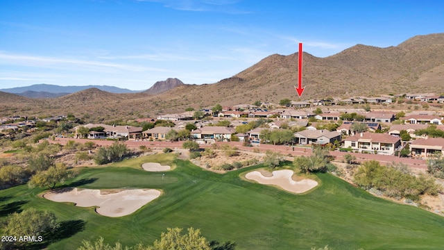 birds eye view of property featuring a mountain view