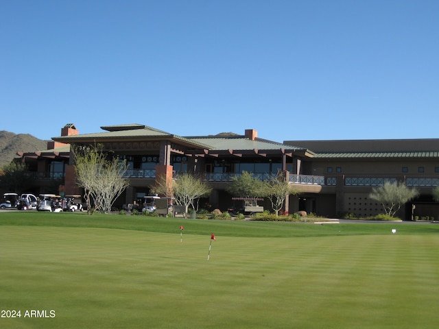 2549 W Shinnecock Way, Anthem, AZ 85086 - view of property's community with view of golf course, an area to practice putting, and a mountain view
