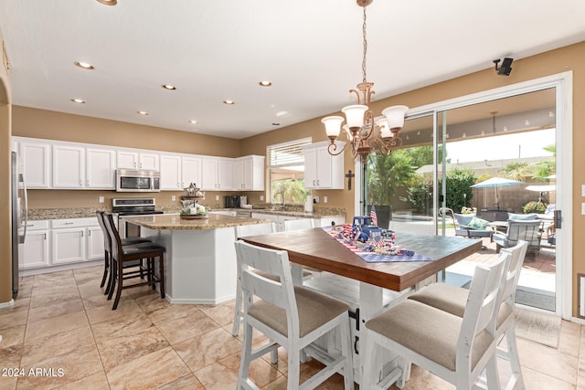 dining room with a chandelier