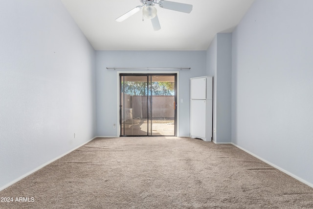 carpeted empty room with ceiling fan