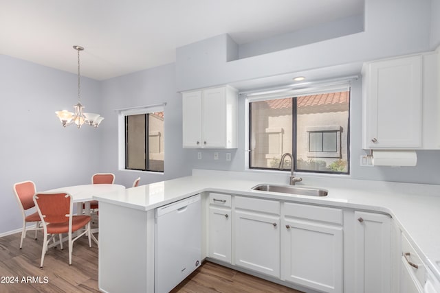 kitchen featuring white cabinetry, white dishwasher, sink, and light wood-type flooring