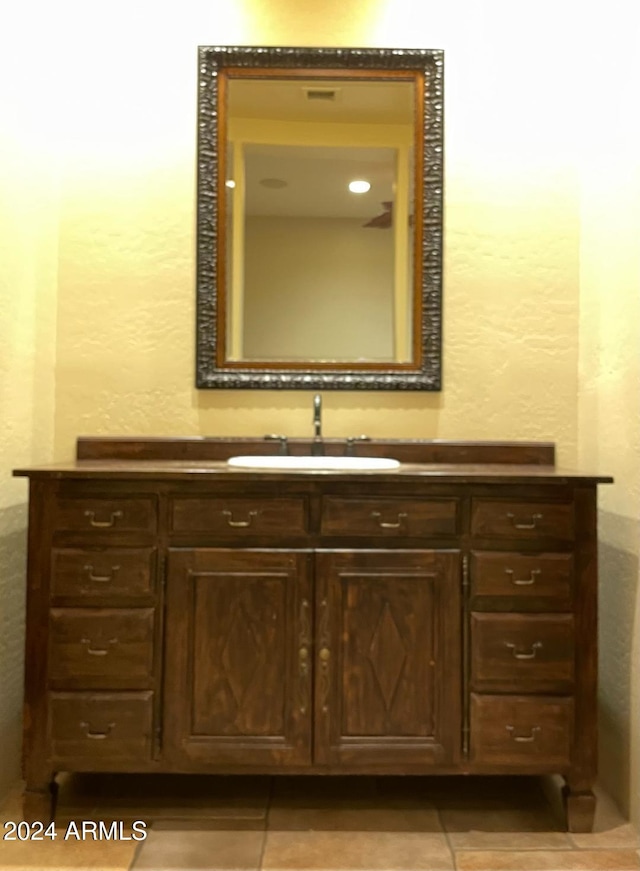 bathroom with vanity and tile patterned floors