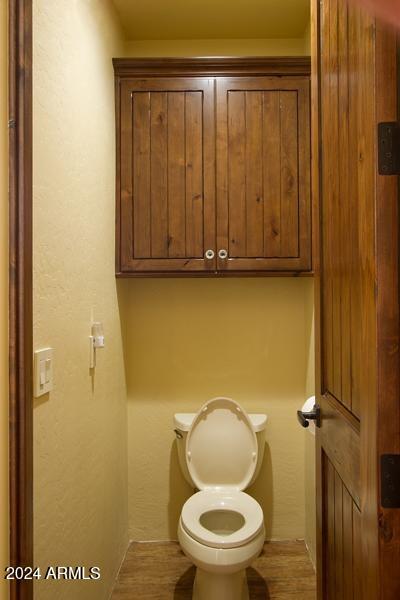 bathroom featuring toilet