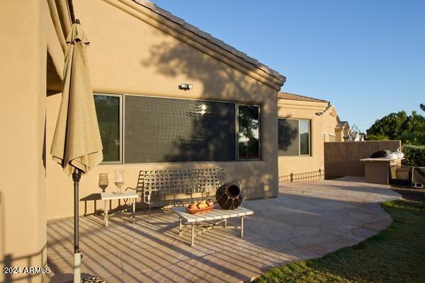 rear view of property with a patio