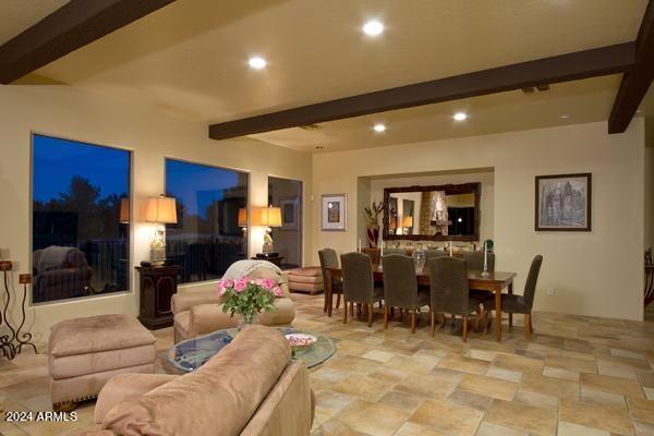 living room with beamed ceiling