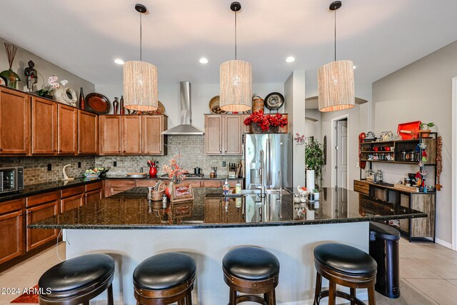 laundry room featuring washing machine and dryer, light tile patterned flooring, sink, and cabinets