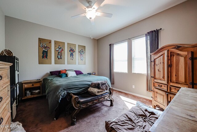 living room featuring ceiling fan and light tile patterned floors