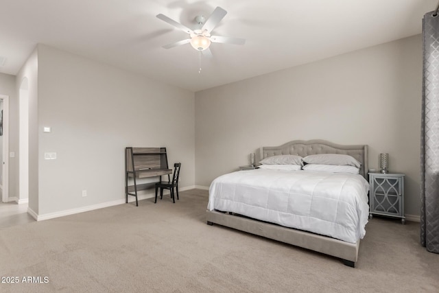 bedroom with ceiling fan and carpet