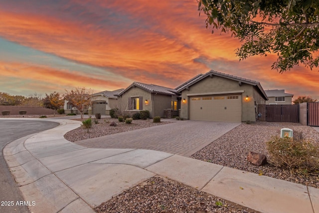 view of front of property featuring a garage