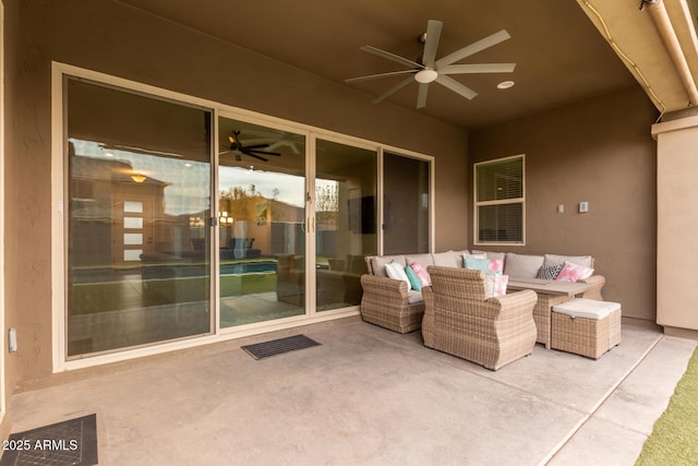 view of patio / terrace with an outdoor living space and ceiling fan