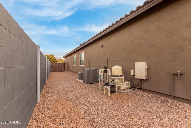 view of yard with central AC unit