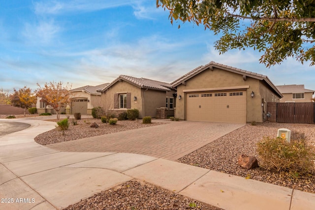 view of front of property featuring a garage