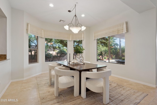 11299 E Greythorn Dr, Scottsdale, AZ 85262 - dining area with light tile patterned floors, recessed lighting, and a chandelier