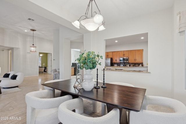 11299 E Greythorn Dr, Scottsdale, AZ 85262 - dining space featuring a chandelier and recessed lighting