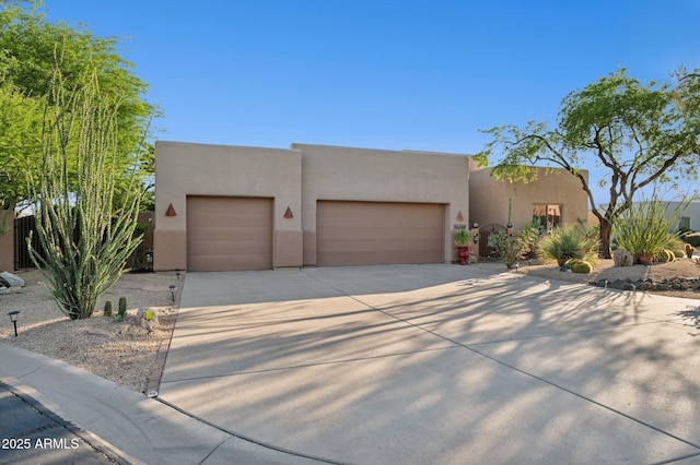 11299 E Greythorn Dr, Scottsdale, AZ 85262 - southwest-style home featuring an attached garage, stucco siding, and driveway