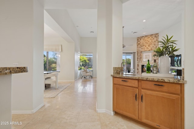 11299 E Greythorn Dr, Scottsdale, AZ 85262 - bar area with plenty of natural light and light tile patterned flooring