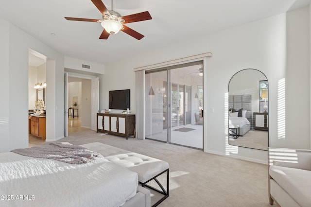 11299 E Greythorn Dr, Scottsdale, AZ 85262 - bedroom featuring access to outside, light colored carpet, ensuite bathroom, and ceiling fan