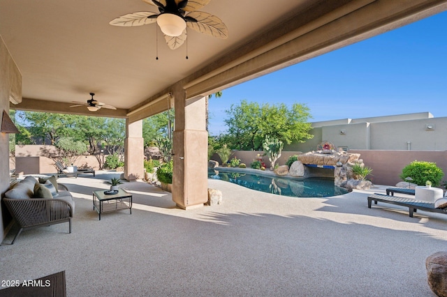 11299 E Greythorn Dr, Scottsdale, AZ 85262 - fenced backyard featuring a ceiling fan, a patio, and an outdoor living space