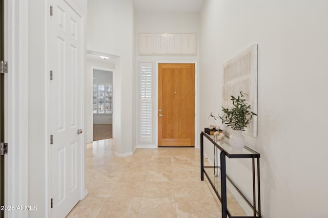 11299 E Greythorn Dr, Scottsdale, AZ 85262 - entryway featuring a towering ceiling and baseboards