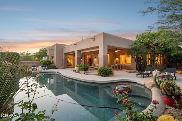 11299 E Greythorn Dr, Scottsdale, AZ 85262 - pool at dusk featuring a patio and an outdoor pool