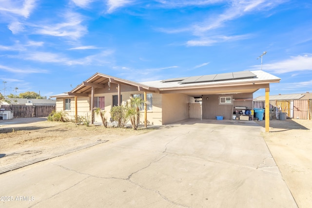 single story home with a carport