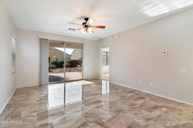 unfurnished room featuring ceiling fan