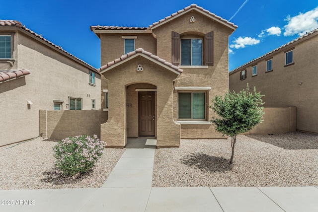 923 E Agua Fria Ln, Avondale, AZ 85323 - mediterranean / spanish-style house featuring stucco siding and a tiled roof