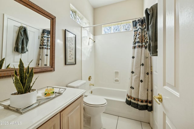 full bathroom featuring shower / bath combo with shower curtain, toilet, vanity, and tile patterned flooring