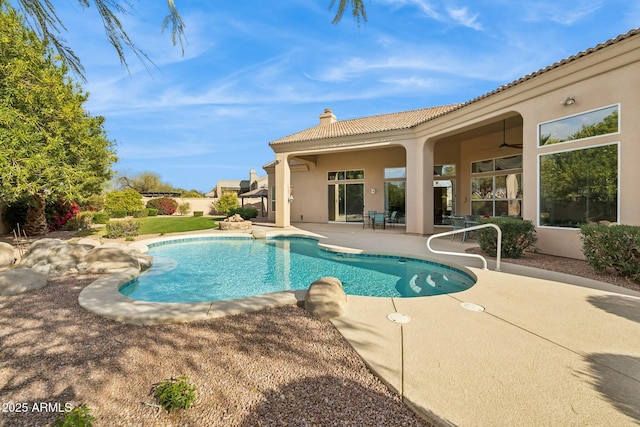 outdoor pool featuring a patio area