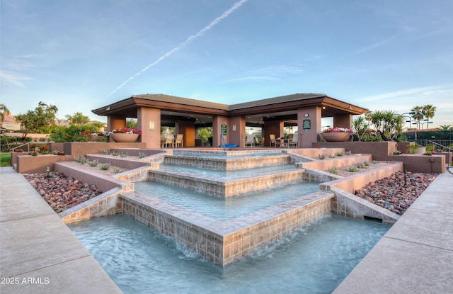 view of pool featuring a pool with connected hot tub