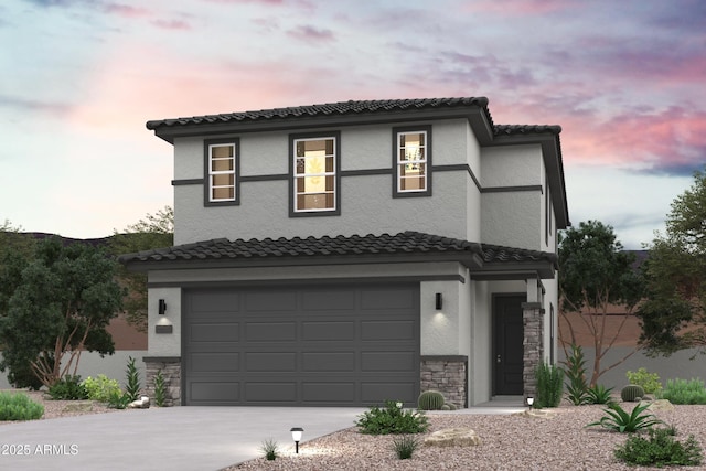 view of front of home featuring a tile roof, a garage, stone siding, and stucco siding