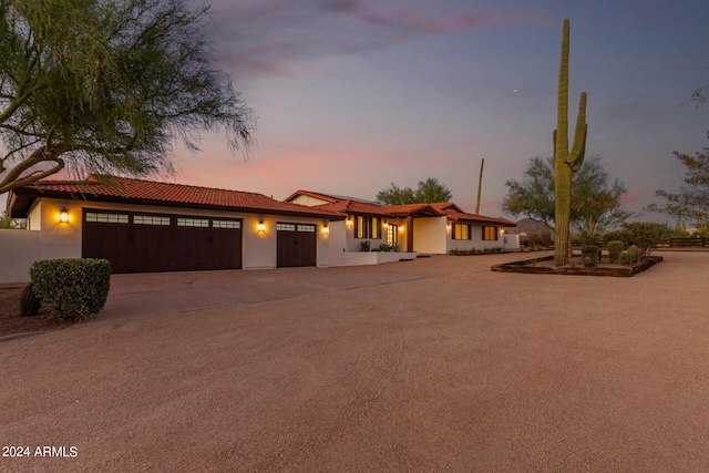 view of front of property featuring a garage