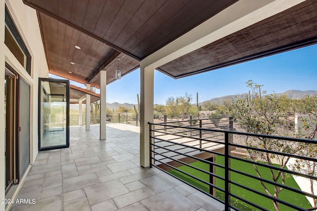 balcony featuring a mountain view