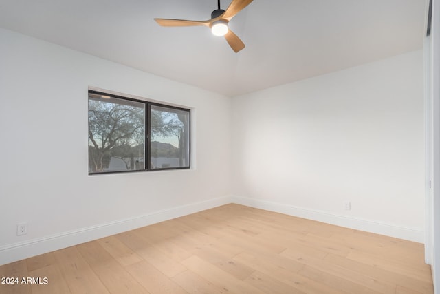 unfurnished room featuring ceiling fan and light hardwood / wood-style floors