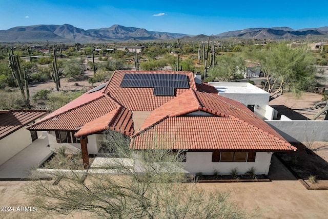 drone / aerial view featuring a mountain view