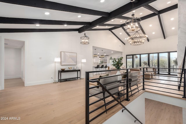 corridor featuring high vaulted ceiling, light wood-type flooring, a chandelier, and beamed ceiling