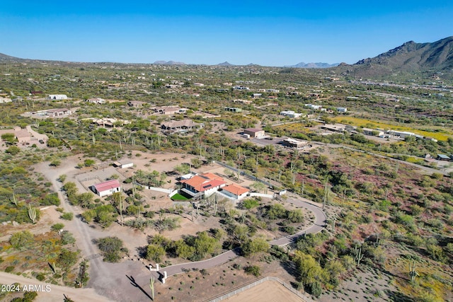 drone / aerial view featuring a mountain view