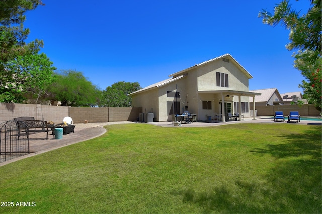 back of property featuring a patio, a fenced backyard, and stucco siding