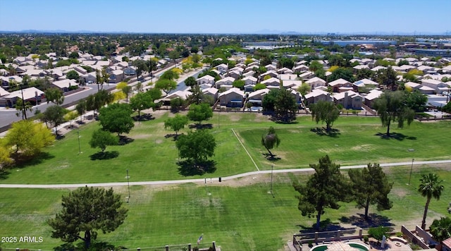 birds eye view of property with a residential view
