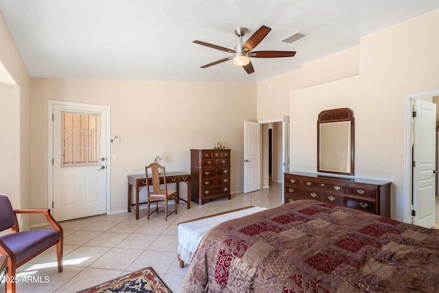 bedroom with light tile patterned floors, visible vents, and ceiling fan