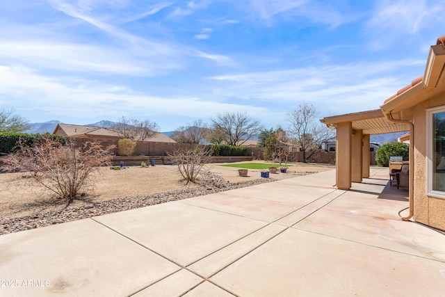 view of patio / terrace with fence