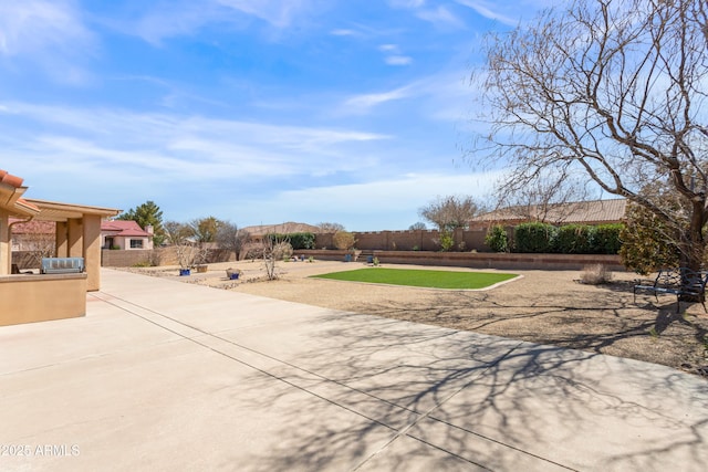 view of yard with fence