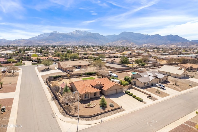 drone / aerial view with a mountain view and a residential view