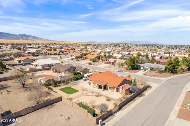 bird's eye view with a residential view and a mountain view