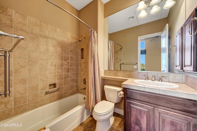 full bathroom with tile patterned floors, shower / bath combination with curtain, toilet, and vanity