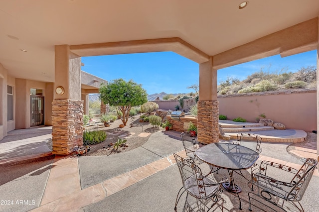 view of patio with area for grilling