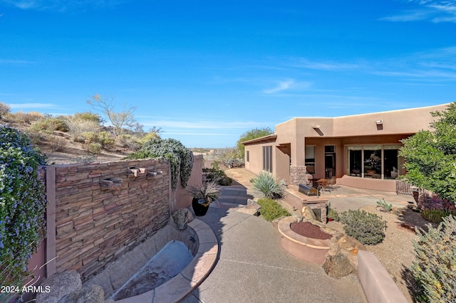 exterior space with a patio area