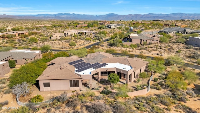 bird's eye view with a mountain view