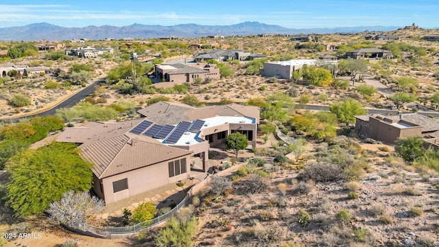 bird's eye view with a mountain view