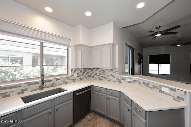 8180 E Shea Blvd Unit 1075, Scottsdale, AZ 85260 - kitchen with dishwasher, gray cabinetry, a sink, a peninsula, and light wood finished floors